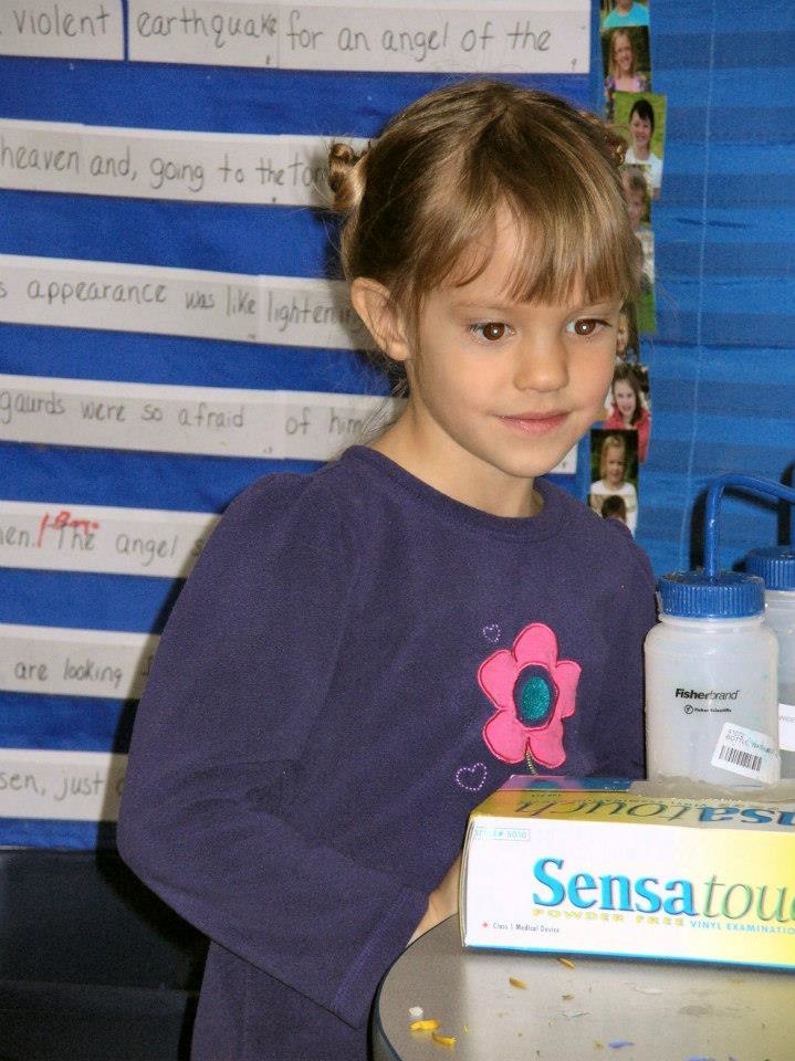 A child attending an outreach event 